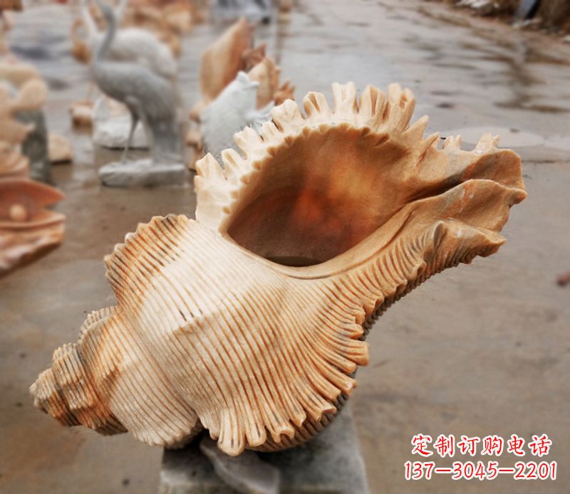 泸州晚霞红海螺石雕广场景观雕塑